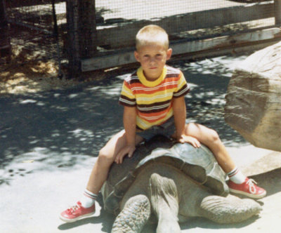I hated this turtle. We went to Marineland, why I do not know. My father DEMANDED that I get atop this nasty, disease ridden turtle so that he could take my picture. Just look at the face of this child. Does it look as if he's having a good time?