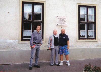 Standing with my uncle Hans & my cousin Mikail, in front of a family church in, Rajka, Hungary.