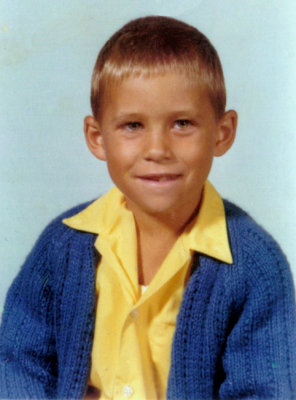 I must have had all kinds of these goofy sweaters. I think it was because my grandmother kept making them for me. This was my 2nd grade photograph, taken while I was attending Chapel Hill Elementary School in Gladstone. I was in Mrs. Metzgar's class & was eight years old when this shot was taken.