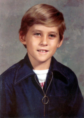 This was our class photo taken at Linden West Elementary School, in Kansas City. I was in Mrs. Hawblitzel's class. I hated that blue shirt. I got in constant trouble from teachers & my mother because I usually chewed on the metal ring that zipped it up & down. Underneath my dress shirt I was proudly wearing one of my Wentworth Military School T-shirts. I was attending Wentworth during the summers. I was eleven years old in this photograph.