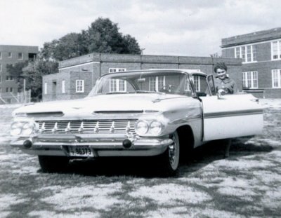 This is a shot of my father's first new car. Shown is his girlfriend at the time, posing with the Imapala. Later she became his wife ... and my mother.