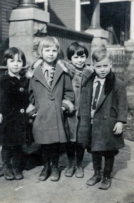 Shown are three of the Merrill children born to, LeRoy Charles Merrill & his wife, Dorothy Mae [Bishop] Merrill. Shown left from right are Dorothy Mae Merrill, unknown childhood friend, Hazel Alice Merrill & their brother, Verne Floyd Merrill