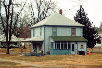 Another view of the house. In 2008, it was painted grey, with a double car garage on the property. 