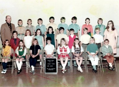 This was my 3rd grade picture. Notice the plaid jacket with the practically knee high pants. I think my mother just laughed and laughed thinking about these pictures.