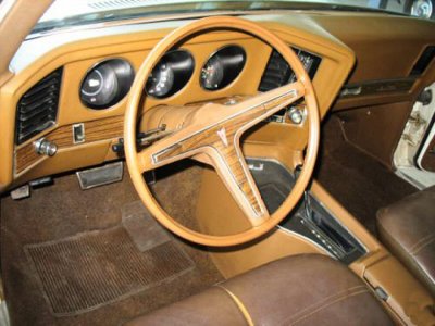 The stering wheel came down very low and you felt like a fighter pilot when driving this beast. 400ci engine that sent you screaming down the road. The trunk was large enough for three grown adults to climb in when sneaking folks into the drive in movies.