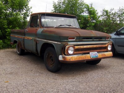 I found this old truck sitting in a parking lot of an appliance store. I had an uncle who had one of these. His was a three speed shift, on the column, powered by a little six cylinder engine that just ran & ran & ran.