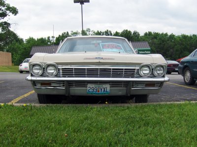 I saw this car sitting in a parking lot with a For Sale sign in the window. This old rusted out four door had a sticker price of $3,000.00 hanging in the window! It probably cost less than 2k brand spanking new. It was a pretty cool car though. Must have been nice in 65. It has an automatic transmission. I expected 3 on the tree.