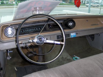I thought this was a cool shot. A dashboard from 1965 with a CD lying on the floorboard. Where's Rod Serling?