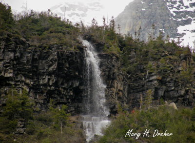 One of the Magnificent Waterfalls along the Sun road