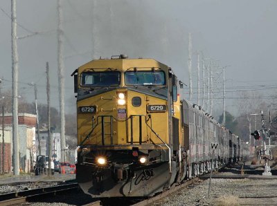 A patched CNW unit leads the circus train into Norfolk Va.