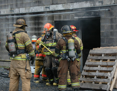 Students exiting the burn building