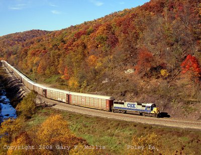 An SD50 is doing the duty pushing the rack train