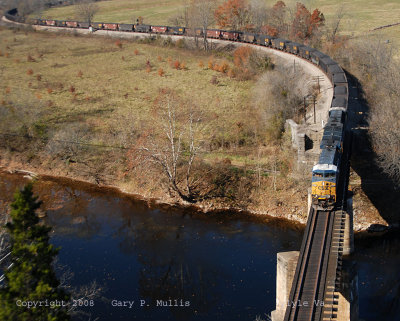 The coal drag from the cliffs above Lyle entering the tunnel.