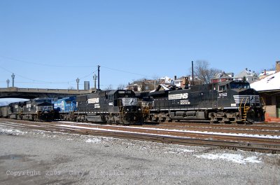 Coal trains wait at South yard before heading east.
