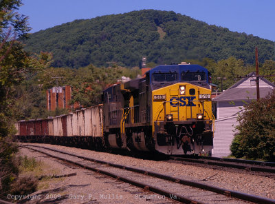 A rare daylight eastbound rock train at Staunton Va. with Betsy Bell in the background.jpg