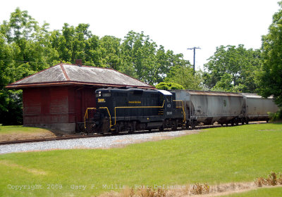 The SVRR passes by the old depot at Fort Defiance.jpg