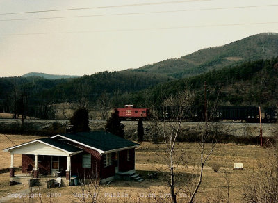 An eastbound coal train along the New River.jpg