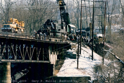 You can see a unit in the river and a car off the side.jpg