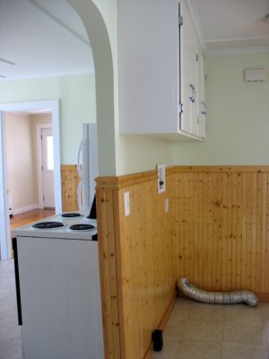 Laundry corner looking through Kitchen to Living Room