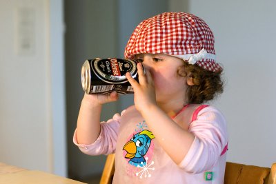 Angelica drinking beer.... well sort of