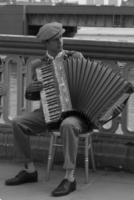 Second Place (Tie)Accordian To Him The Music Is In Black And WhiteBy Katerina_D