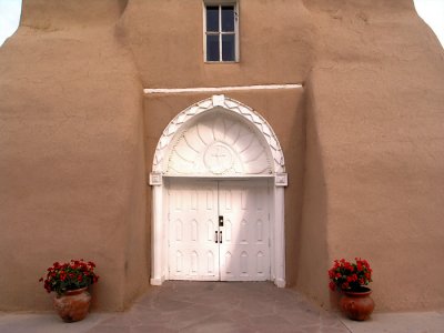 Doors into Rancho De Taos Church by John C