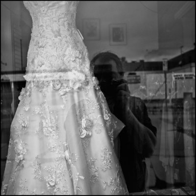 Dress In Consignment Shop Window by R C Johnson