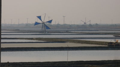 Outside of Bangkok -- windmill power at salt ponds.