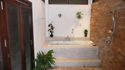 A separate room, which opens to the yard, for our bath and shower.