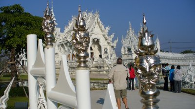 Note the four-sided skull finials on the fence.