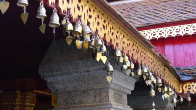 People buy bells to adorn the eaves.  Ringing bells is an important part of Buddhist worship.