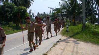 We rented a scooter to explore the island.  Saw troops of scouts hiking up one side of the road.