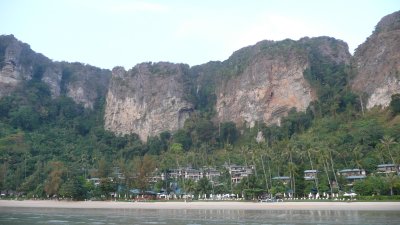 The Centara Grand is located in an isolated cove, up against huge limestone cliffs.  The only ways in/out are by boat or walking