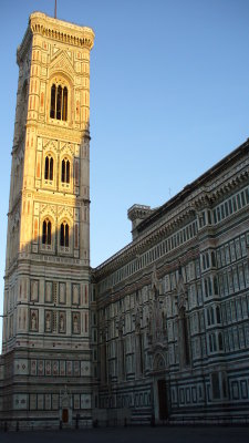 The morning sun hitting the bell tower of Santa Maria del Fiore (Duomo) church.
