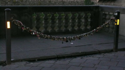 Hundreds of padlocks, attached to chains that line the Arno walkways, because of a popular romantic story.