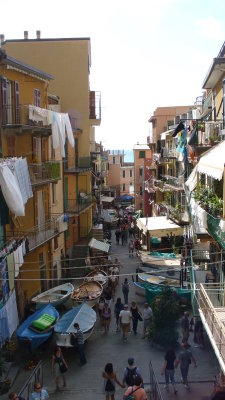 Walking down through Manarola to the harbor.  Notice the boats stored on the street.
