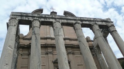 At the Forum, a temple incorporated into a church.  Notice the cuts high on the marble columns from scavengers.