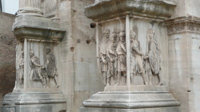 The arch of Septimus Severus -- reliefs show soldiers bringing barbarian slaves back to Rome.