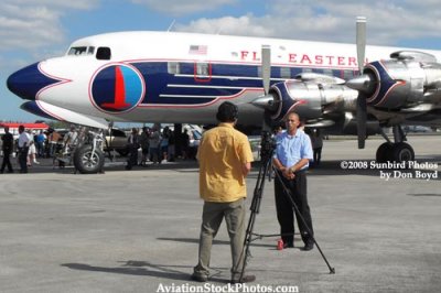 2008 - Carlos Gomez, co-owner of DC-7B N836D, being interviewed at the Open House stock photo #10039