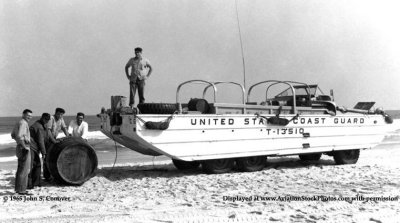 1965 - Coasties and a Coast Guard Duck (DUKW) amphibious vehicle