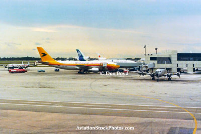 1978 - a Constellation, Aerocondor A300, Air New Zealand DC10-30, National DC-10 and cargo DC6 at MIA's E-Satellite
