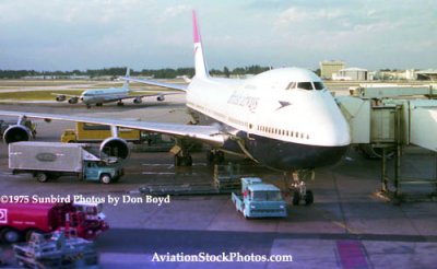 1975 - British Airways B747 on gate 53 as a Pan Am B707 taxies in the background