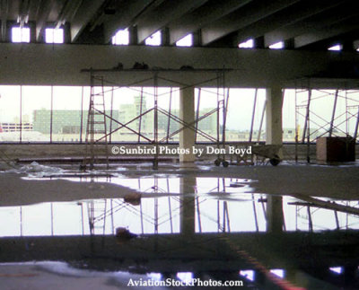 1976 - inside the north end of the E-Satellite which was under construction with water on the floor