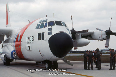 1984 - Coast Guard HC-130H #CG-1703 and air crew at MIA after emergency diversion landing military stock photo #CG8402