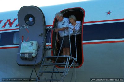 2010 - Roger Jarman and stewardess onboard the HFF's restored Eastern Air Lines DC-7B N836D aviation stock photo #1264