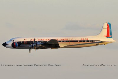 Historical Flight Foundation's restored Eastern Air Lines DC-7B N836D flyby at Homestead Air Reserve Base aviation stock #6387