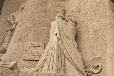Scupture depicting the selling of Jesus.  The numbers in the blocks all add up to 33, the age of Jesus