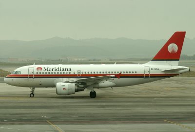 Meridiana A-319 taxi to its gate, MAD, Jan 2009