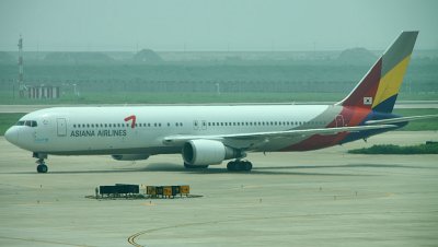 Asiana B-767-300 approaching its gate in PVG