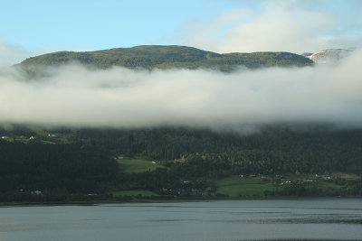 Morning fog hanging around the mountina, Voss